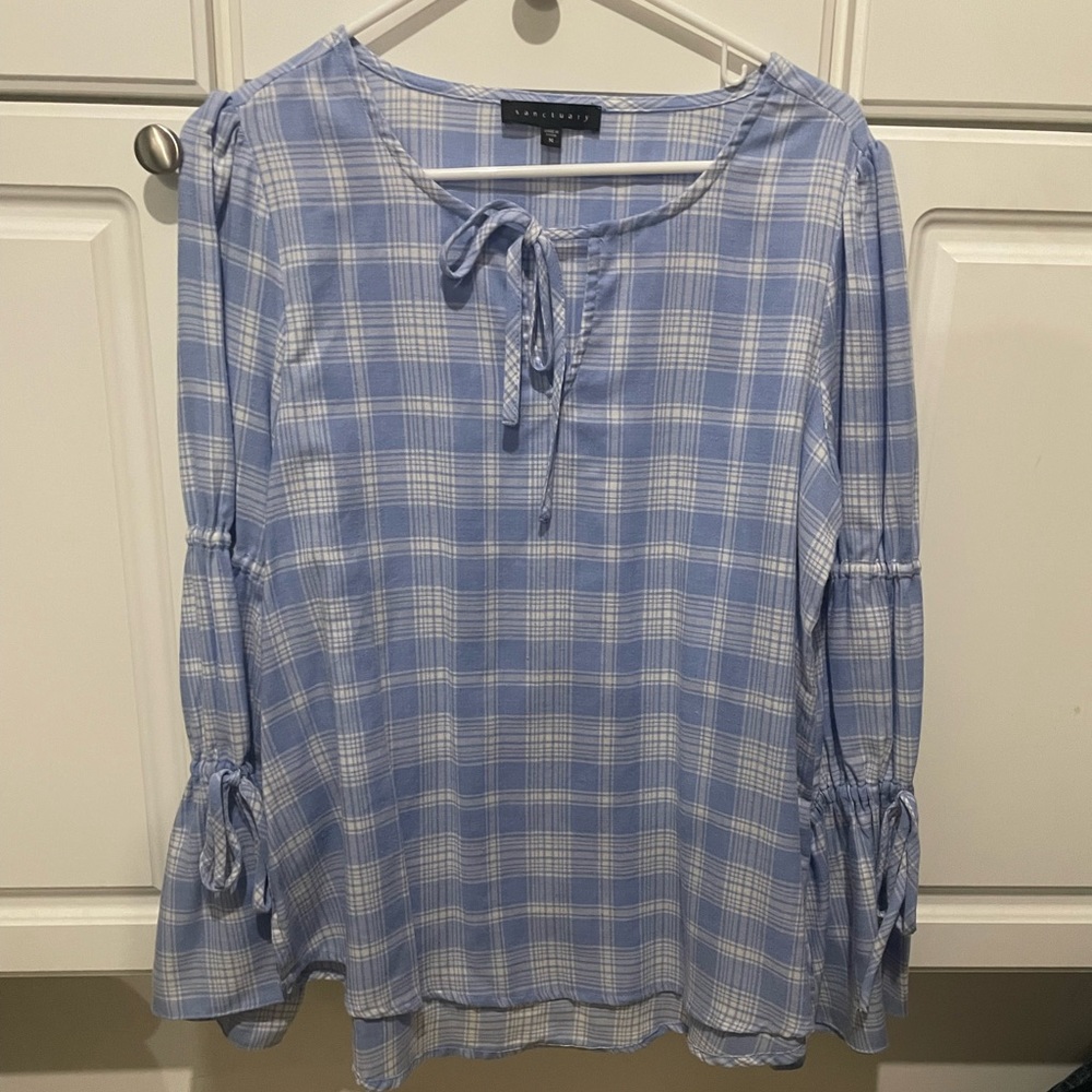 Women’s medium tunic, Blue plaid. New never worn. Two ruffles on sleeves.